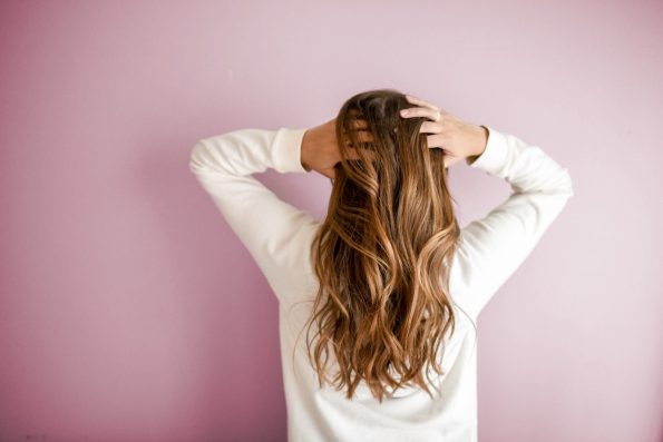 Hair loss is more common in women than you might think and it can be caused by various factors such as hormonal changes, stress, nutritional deficiencies, and genetics